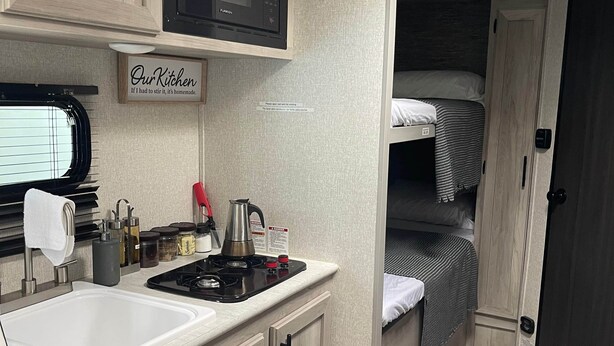 Fridge, microwave, stovetop, cookware/dishes/utensils