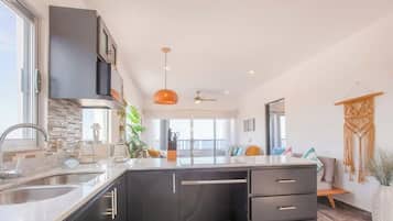 Coffee/tea maker, fridge, microwave, oven