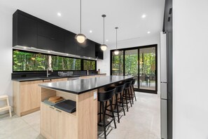 Fridge, microwave, oven, stovetop - Spacious 6-Bedroom Chalet for 13 | Near Owl’s Head Ski & Golf (Potton)