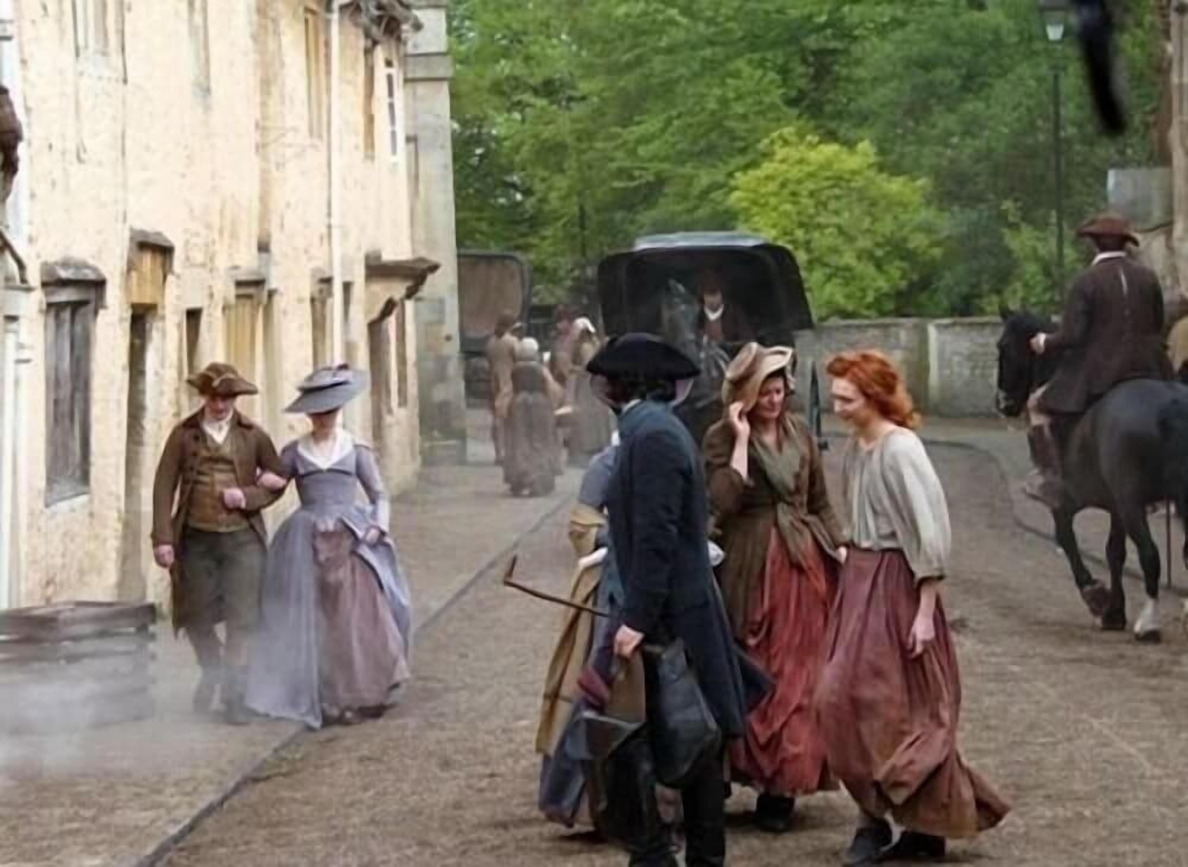 A historical street scene with buildings, people in period clothing, and a horse-drawn carriage.