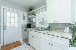 Fridge, microwave, oven, stovetop - The Farmhouse | BBQ Grill • Patio • Close to DT! (Asheville)