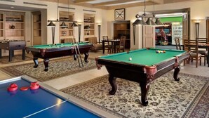 A pool room with two pool tables, a foosball table, and a billiards table. - Resorts among beautiful mountains in Escondido, CA with 2 beds,full kitchen (Escondido)