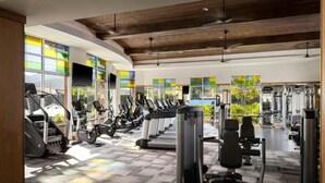 A gym with treadmills, elliptical machines, and weight equipment. - Resorts among beautiful mountains in Escondido, CA with 2 beds,full kitchen (Escondido)