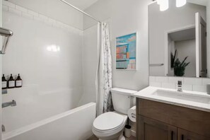Hair dryer, towels, soap, toilet paper