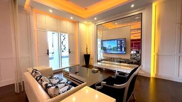 Chambre Double Deluxe | Coin séjour