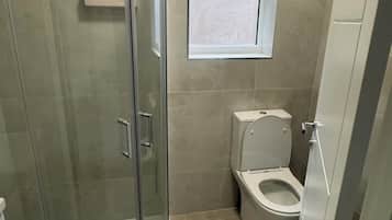 Shower, towels, soap, shampoo