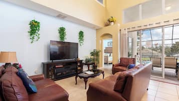 Casa Deluxe, vista piscina | Area soggiorno