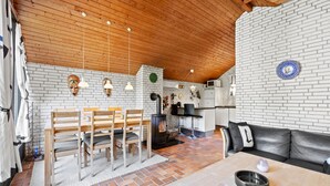 A cozy interior with a dining area, kitchen, and seating space. - 3 bedroom amazing home in Nørre Nebel (Nørre Nebel)