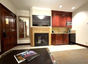Fridge, coffee/tea maker, toaster, cookware/dishes/utensils