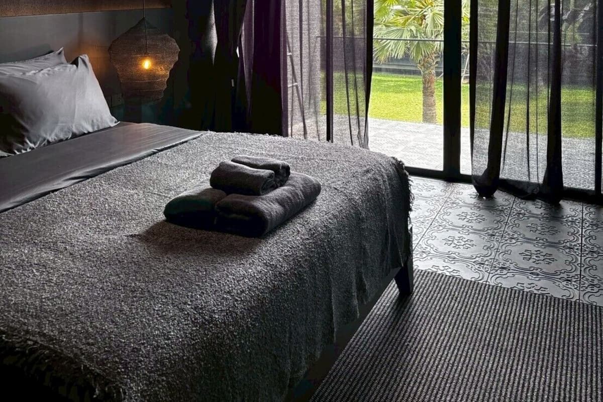 Suite, uitzicht op tuin