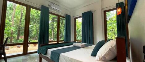 Kahden hengen deluxe-huone, näköala puutarhaan | Näkymä puutarhaan