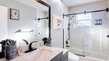 Hair dryer, bidet, towels, soap