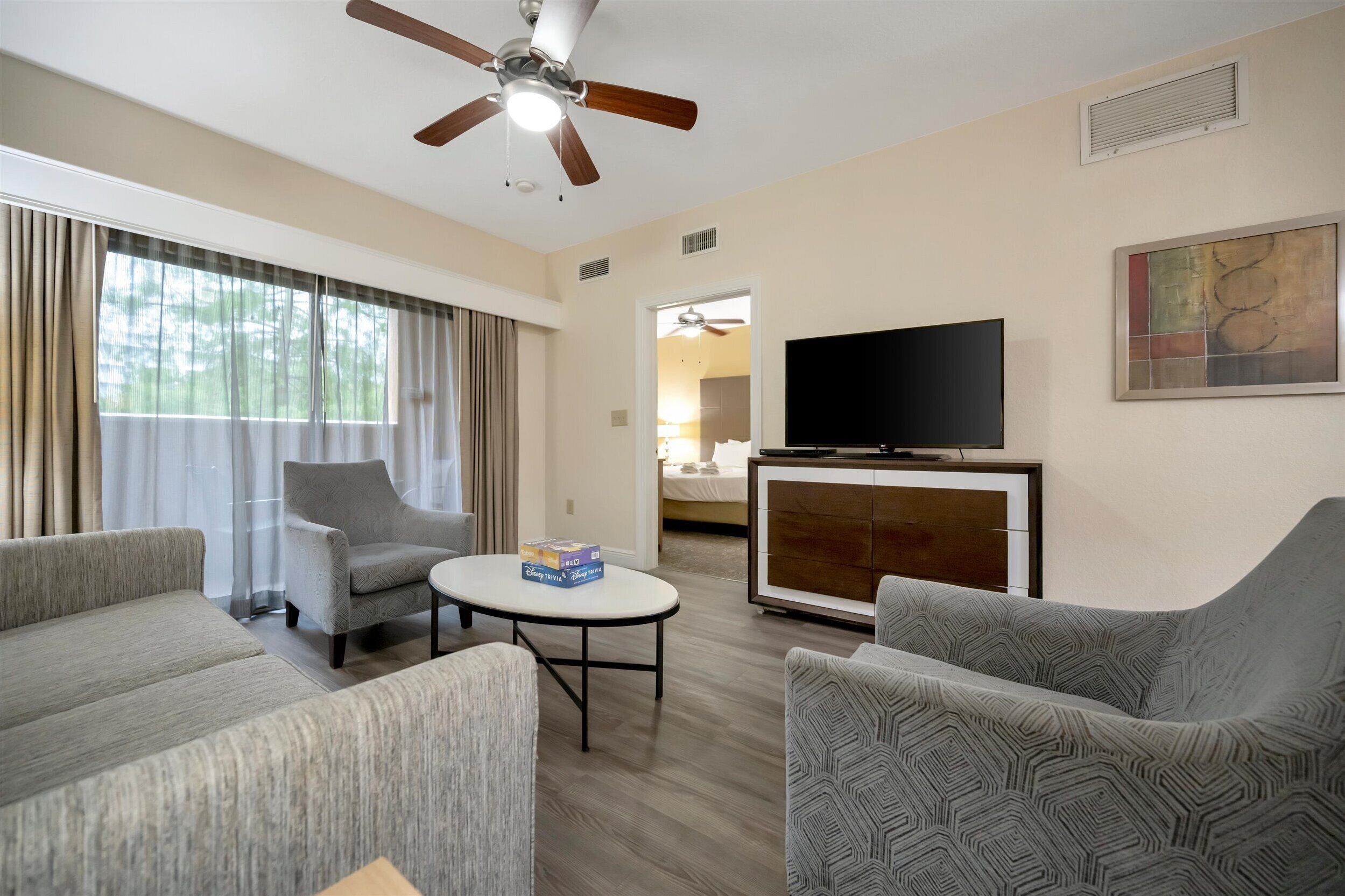 Signature Condo, 2 Bedrooms, Lake View | Living area | 50-inch Smart TV with digital channels