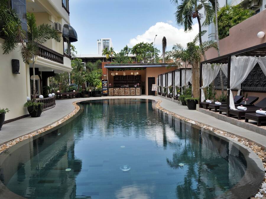 Outdoor pool, open 9:00 AM to 9:00 PM, sun loungers