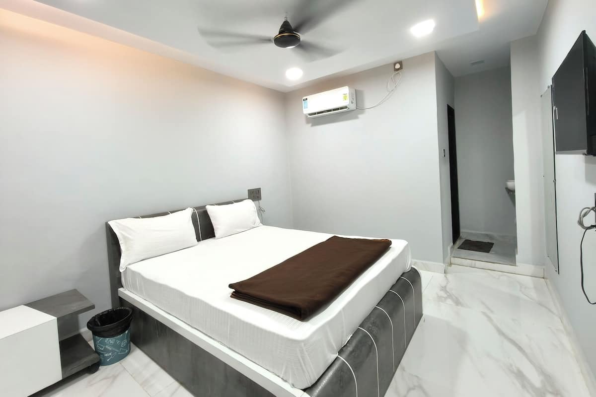 Quarto casal luxo, vista para a cidade