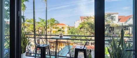 Deluxe Quadruple Room, Balcony, Garden View | Interior