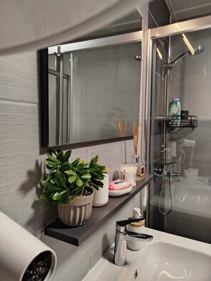 Shower, hair dryer - 7th Floor cozy condo with parking, pool, fitness ! (Skopje)