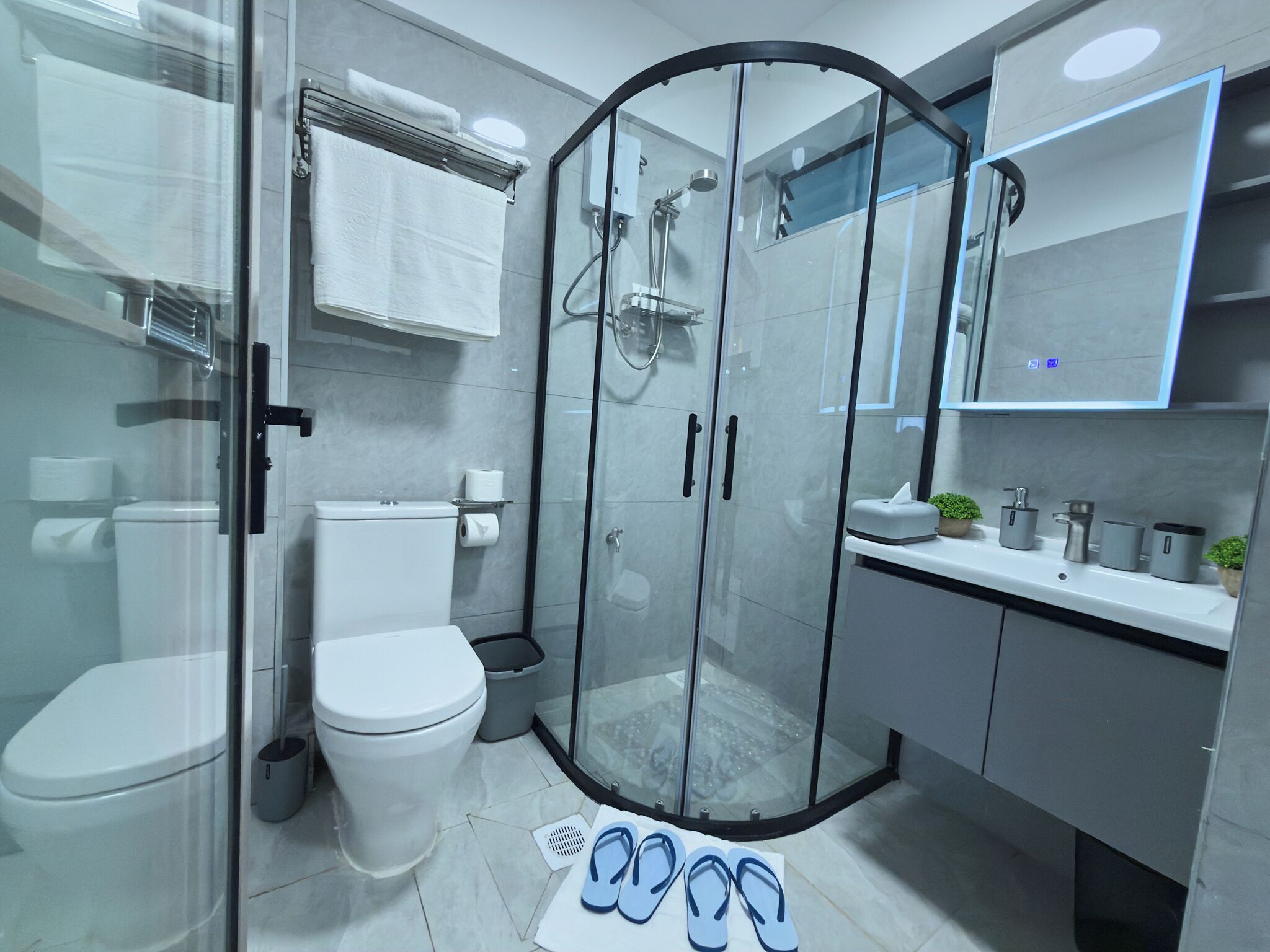 Apartment, Balcony, City View | Bathroom | Free toiletries, slippers, towels, soap