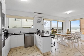 Fridge, microwave, oven, stovetop - Wake to Waves in Spacious 3-Bed Beachfront Unit (Mermaid Beach)