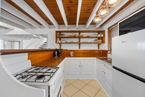 Fridge, microwave, oven, stovetop - Chic 2-Bed Cabin-Style Home by Mooloolaba Beach (Mooloolaba)