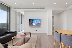 Smart TV, offices - Luxe 2-Bed: Modern Interiors, Balcony & BBQ Area (Lidcombe)