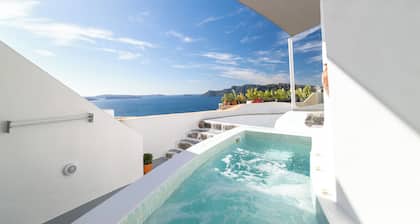Deluxe Cave Villa with outdoor Hot Tub and Caldera View