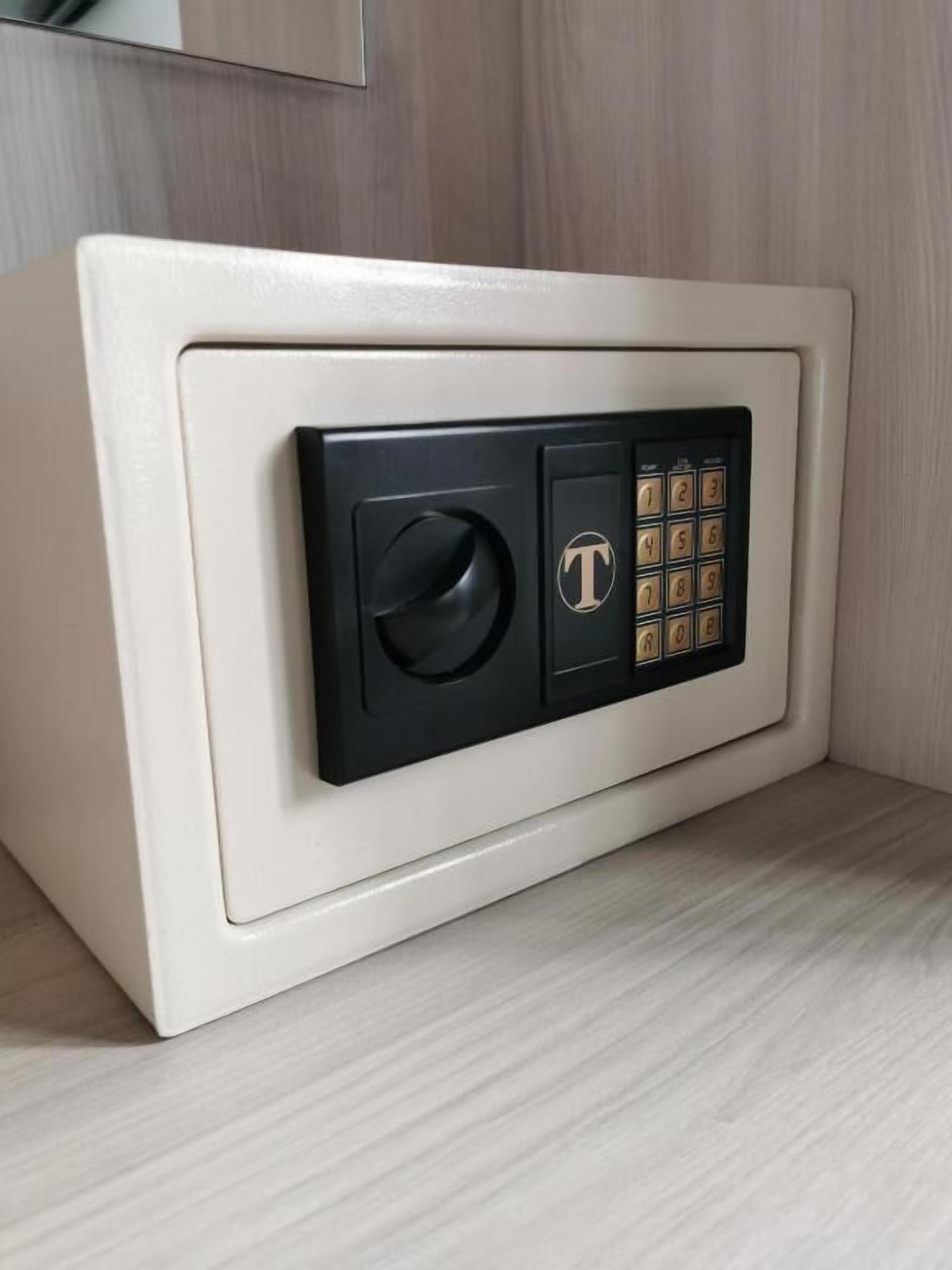 A secure safe with a keypad and a lock.