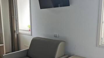 Kolmen hengen superior-huone, vuoristonäköala | Oleskelualue