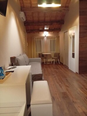 Suite Junior, vue montagne | Coin séjour