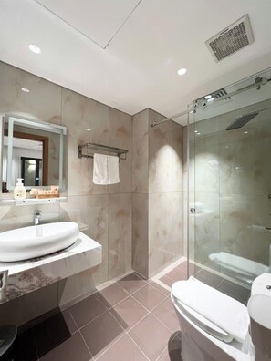 Luxury Apartment, No Windows | Bathroom | Shower, hair dryer, slippers, towels - Sun Hotel Phu Quoc (An Thoi)