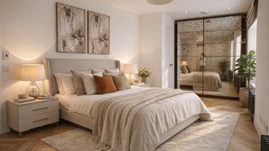 A bedroom with a bed, nightstands, a mirror, and a view of a balcony. - Serene 3-Bed Retreat for 6 - Elegant Central Home (London)