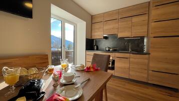 Comfort-Apartment, Bergblick | Speisen