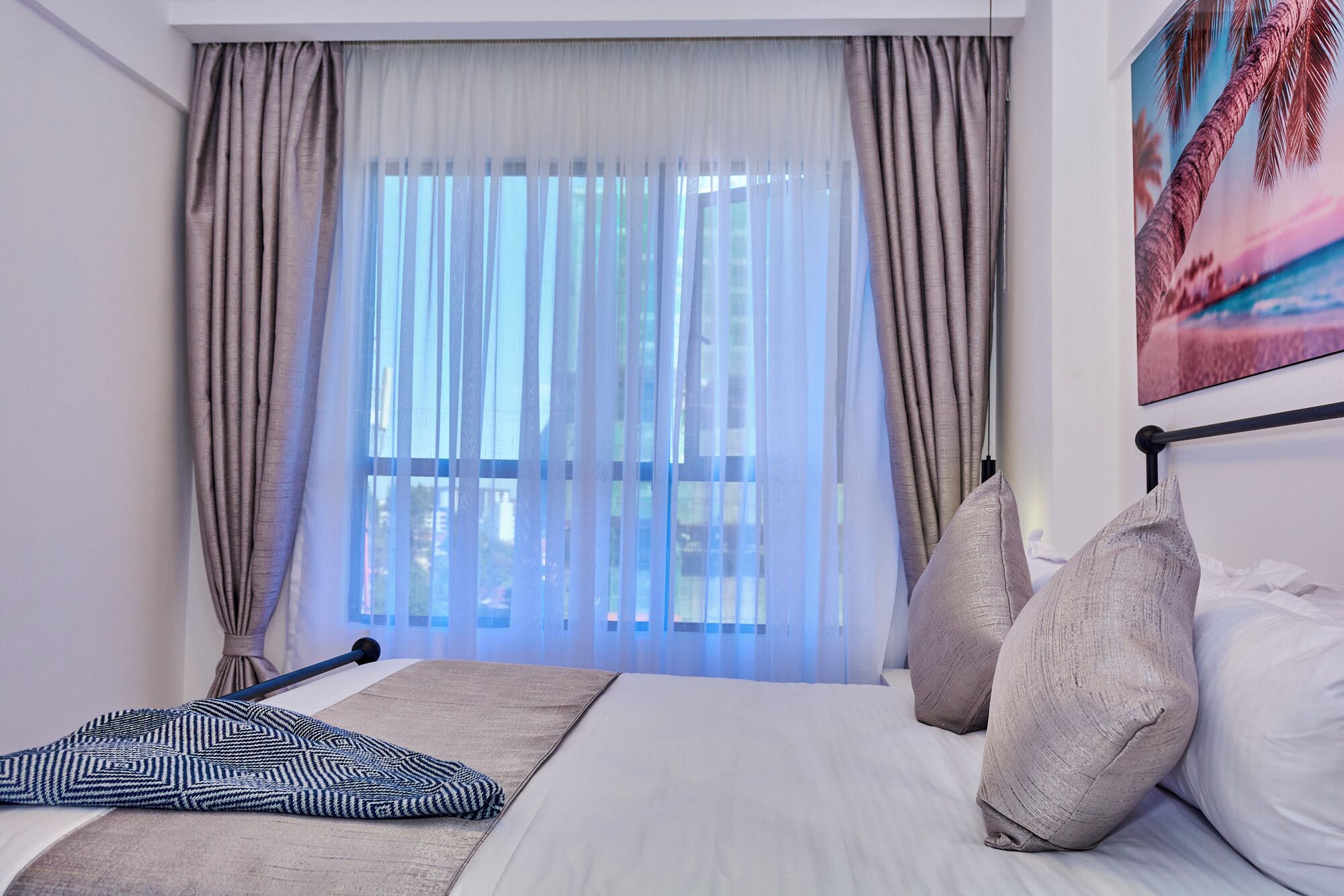 Apartment, City View | Desk, laptop workspace, blackout drapes, iron/ironing board