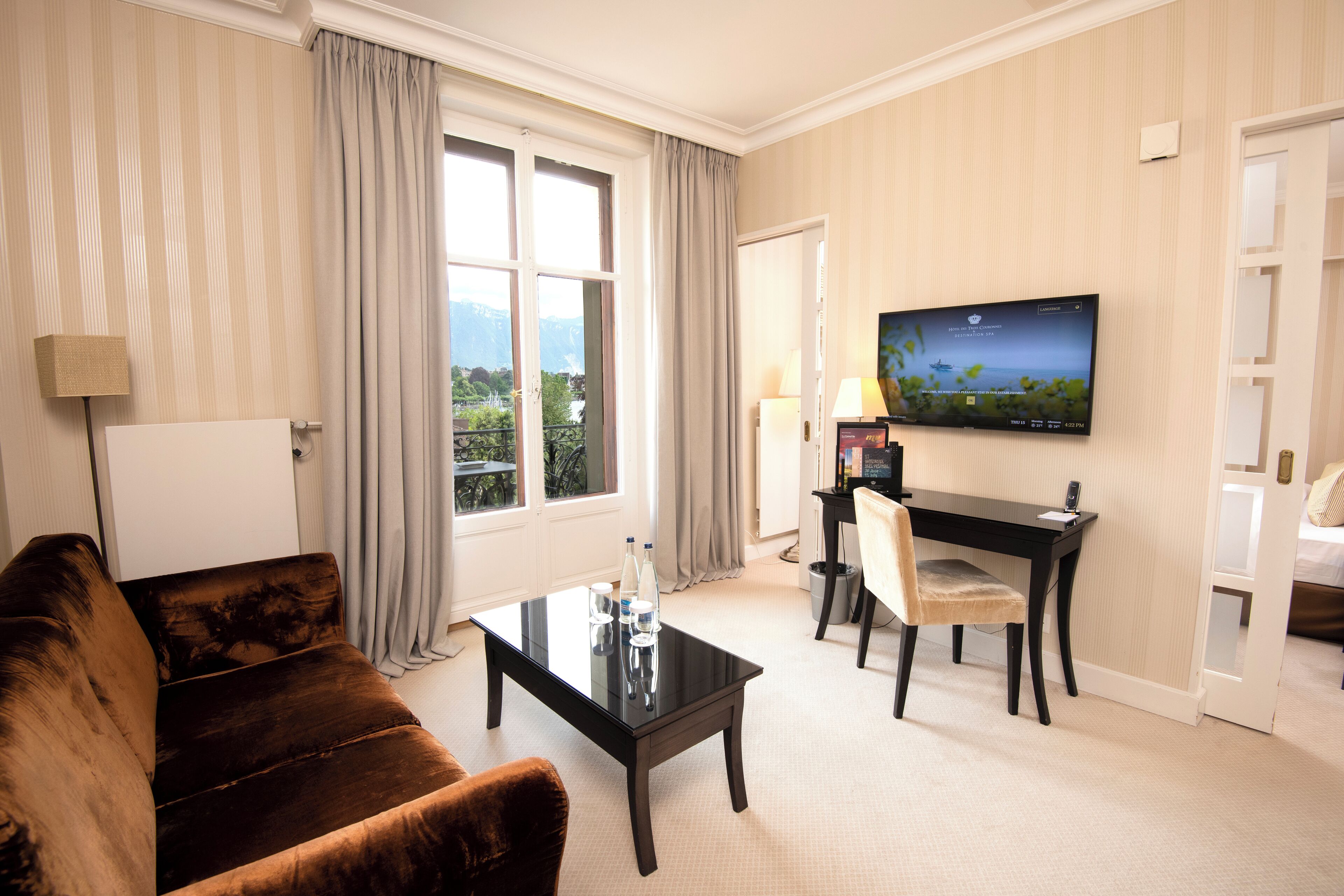 Suite Deluxe, balcone, vista lago parziale | Area soggiorno