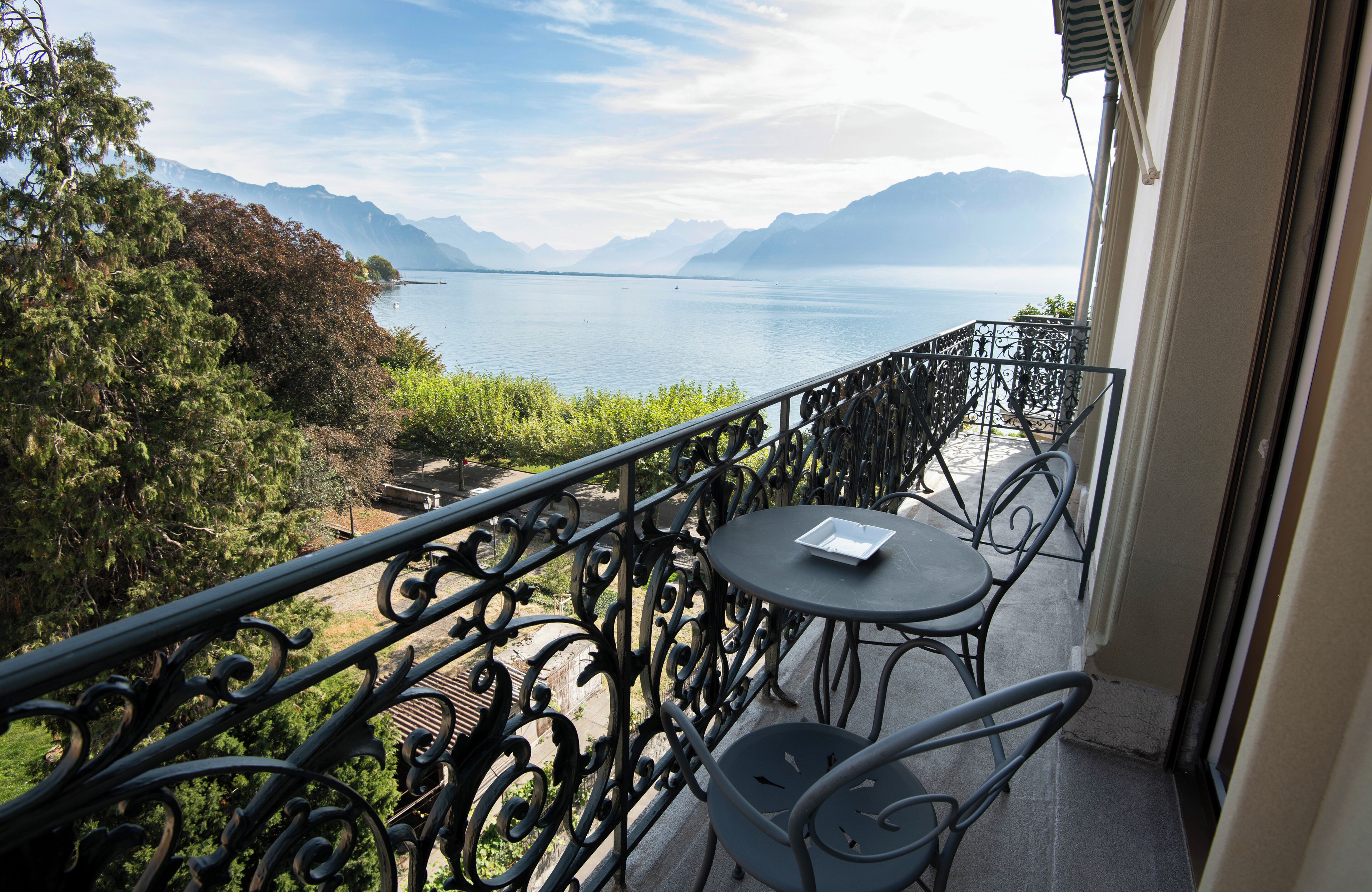 Junior Room, Balcony, Partial Lake View | Property grounds