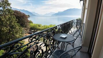 Junior Room, Balcony, Partial Lake View | Property grounds