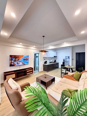Living area - Modern 1BR w/ pool, gym, dedicated workstation, restaurant and full backup power (Nairobi)