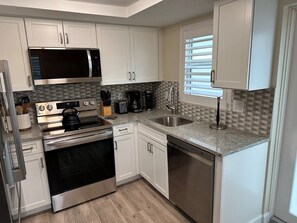 Fridge, microwave, dishwasher, coffee/tea maker - A12 - Stay. Relax. Repeat. (Sarasota)