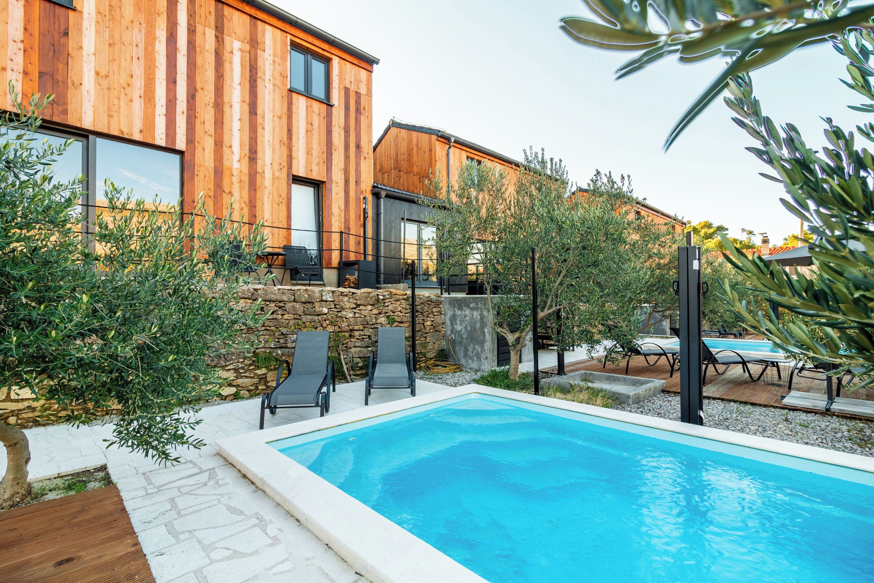 Outdoor pool, pool umbrellas, pool loungers