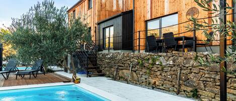 Outdoor pool, pool umbrellas, pool loungers