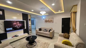 Family Apartment, Balcony, City View | Living area