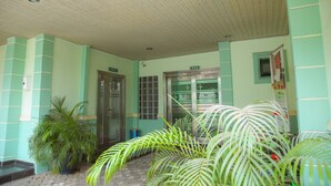 A building with a tiled floor, a door, and a window. - Green House Hotel And Suites (Lagos)