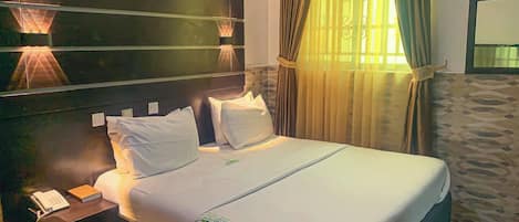 Family Room, Balcony, City View | Desk, laptop workspace, blackout drapes, soundproofing