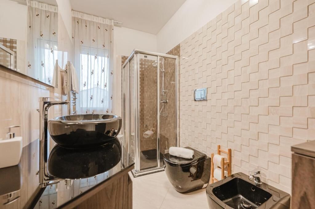 Apartment, Balcony, City View | Bathroom | Shower, free toiletries, hair dryer, bidet