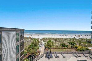 On the beach - 3 bedroom 2.5 bath OF condo in Crescent Beach. Sleeps 8. Elevator. Pool. (North Myrtle Beach)