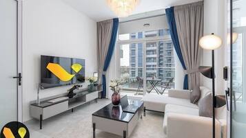 Appartement Luxe, balcon, vue ville | Coin séjour