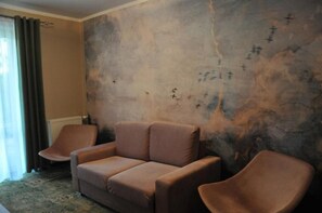 Apartment, Garden View | Living area - Ośrodek Wypoczynkowy Wielki Błękit (Łukęcin)