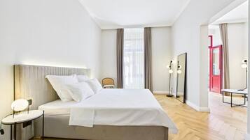 Deluxe Suite, Balcony, City View | Iron/ironing board, free WiFi