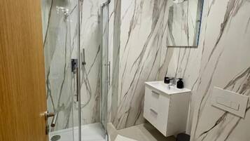 Premium Apartment, City View | Bathroom | Bathtub, towels, toilet paper