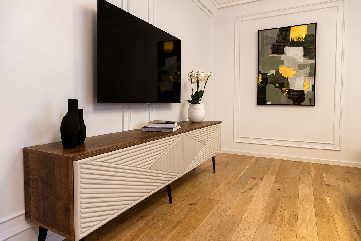 A modern living room with a wooden console table, a flat-screen TV, and a painting on the wall.